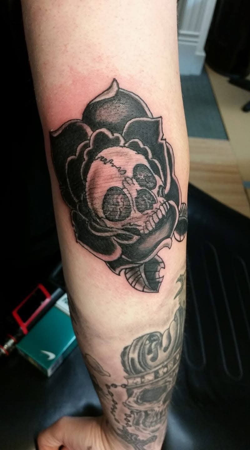 Traditional rose tattoo