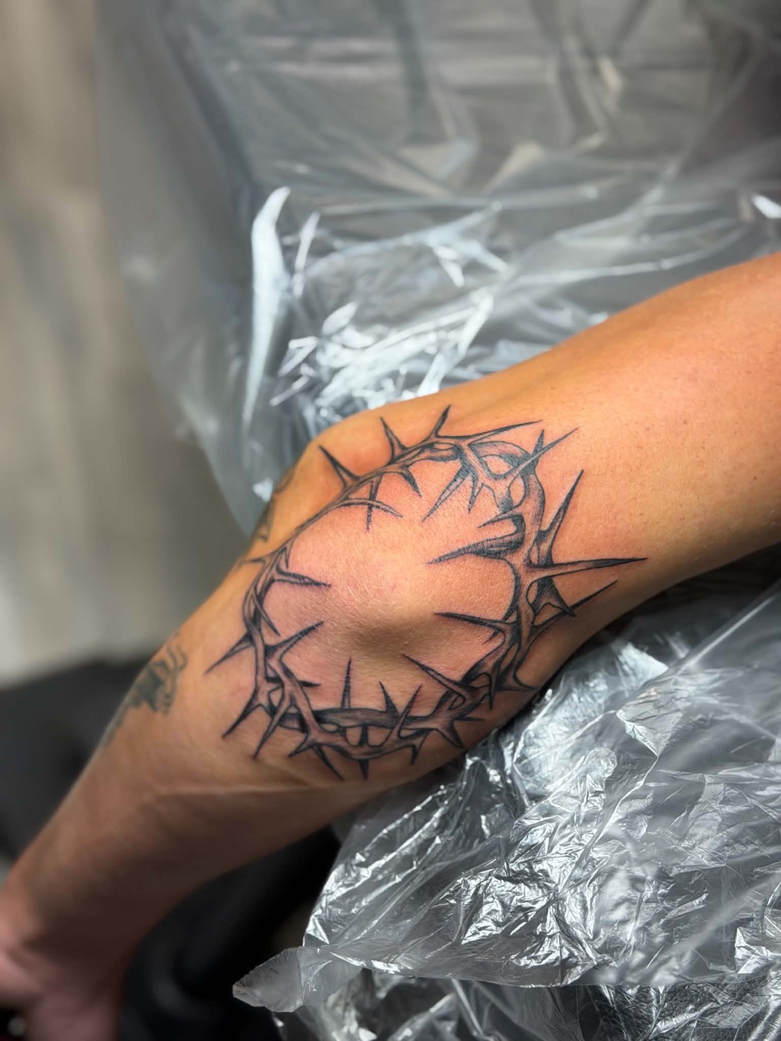 Fine line floral botanical tattoo