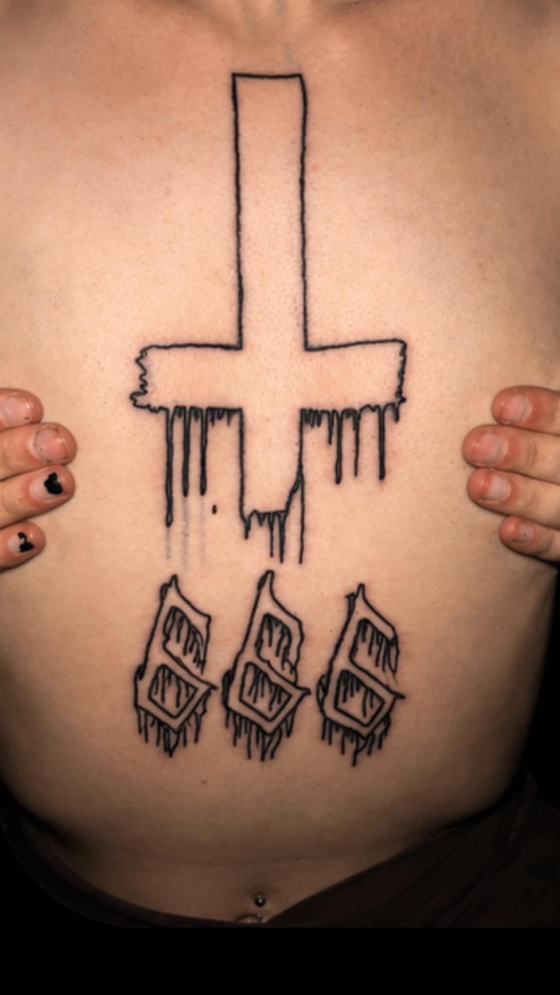 Dripping inverted cross with candles stomach tattoo