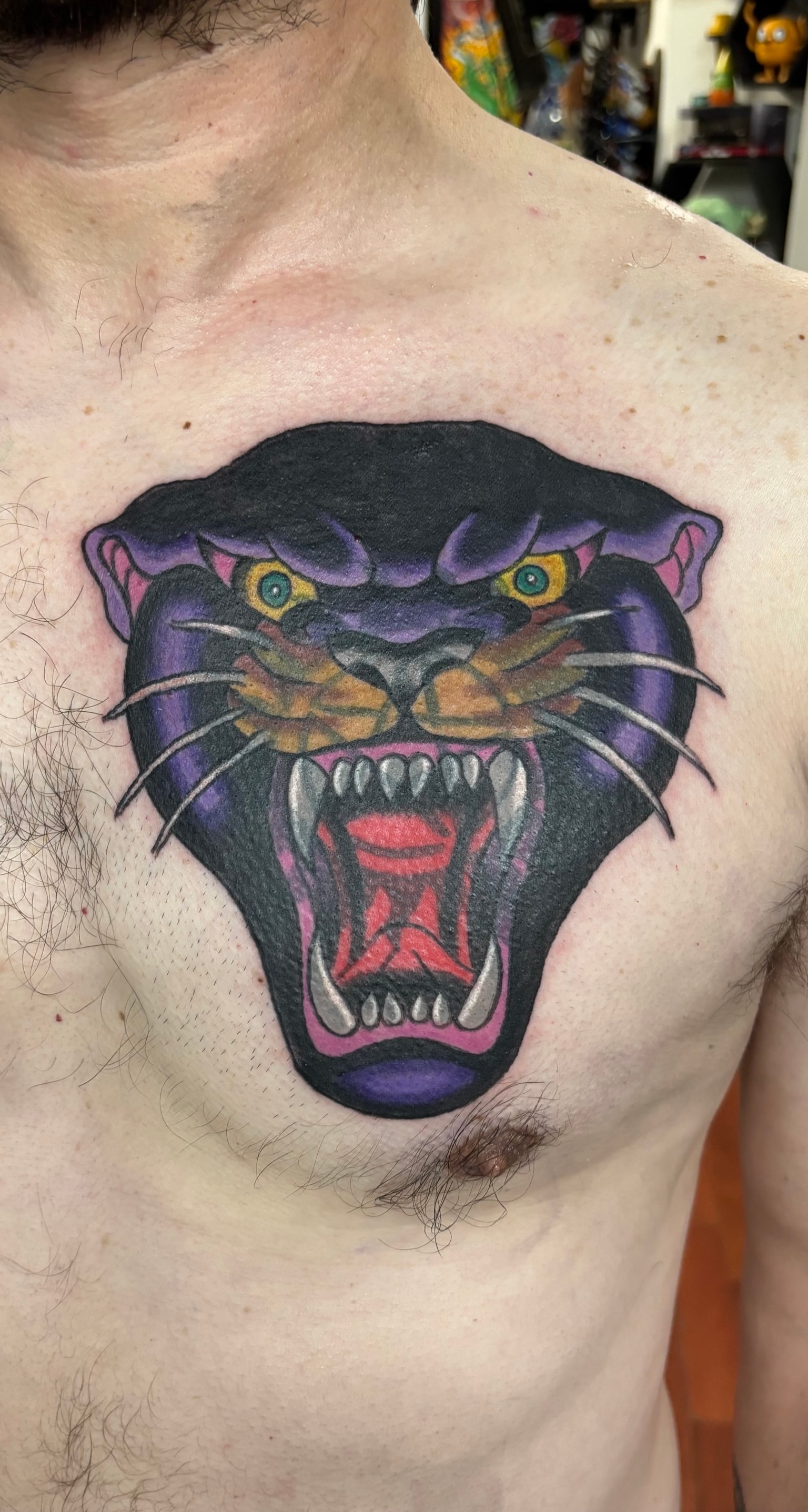 Randy DeShong purple panther chest tattoo