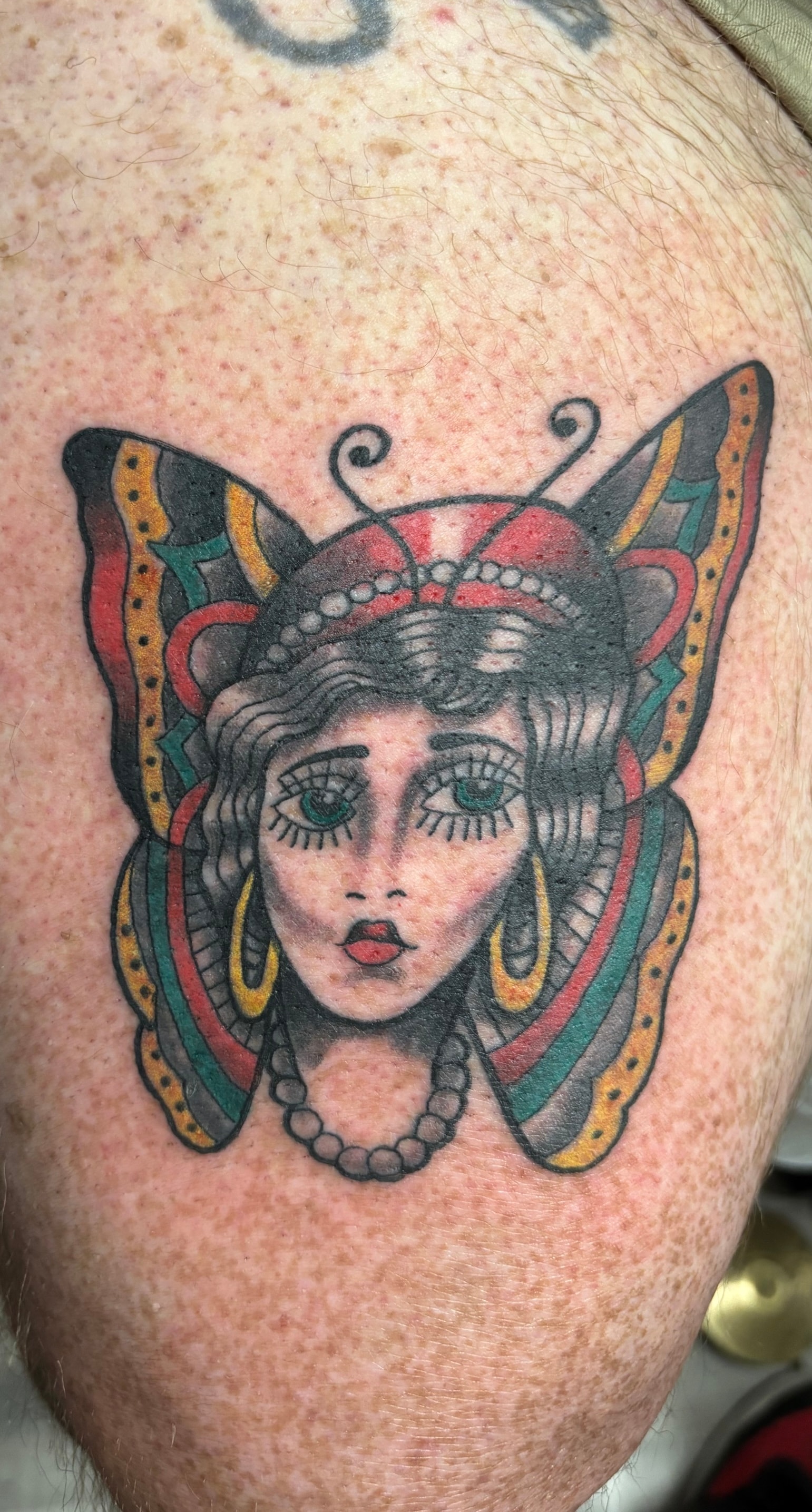 Randy DeShong butterfly woman tattoo