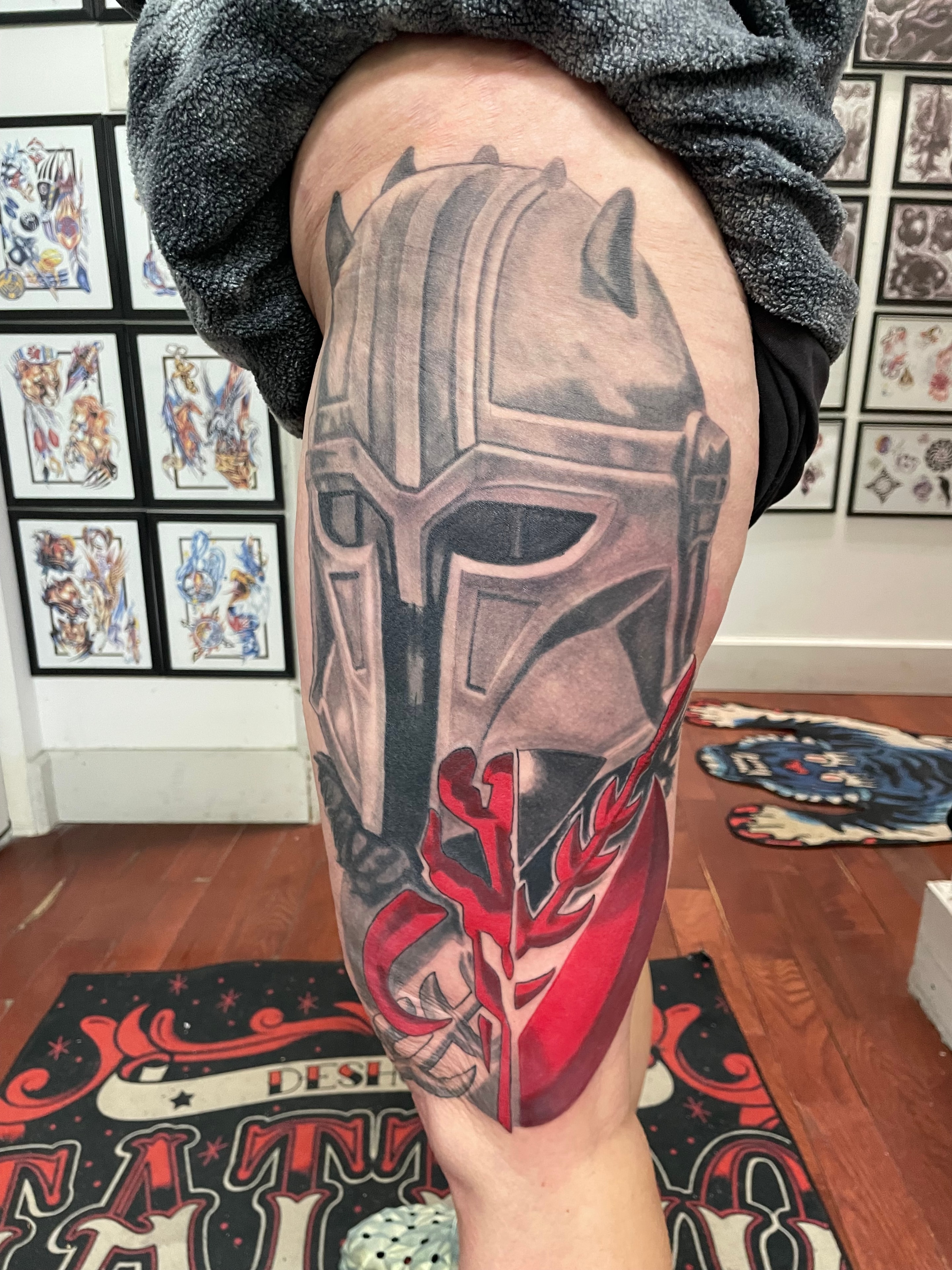 Randy DeShong Mandalorian helmet arm tattoo
