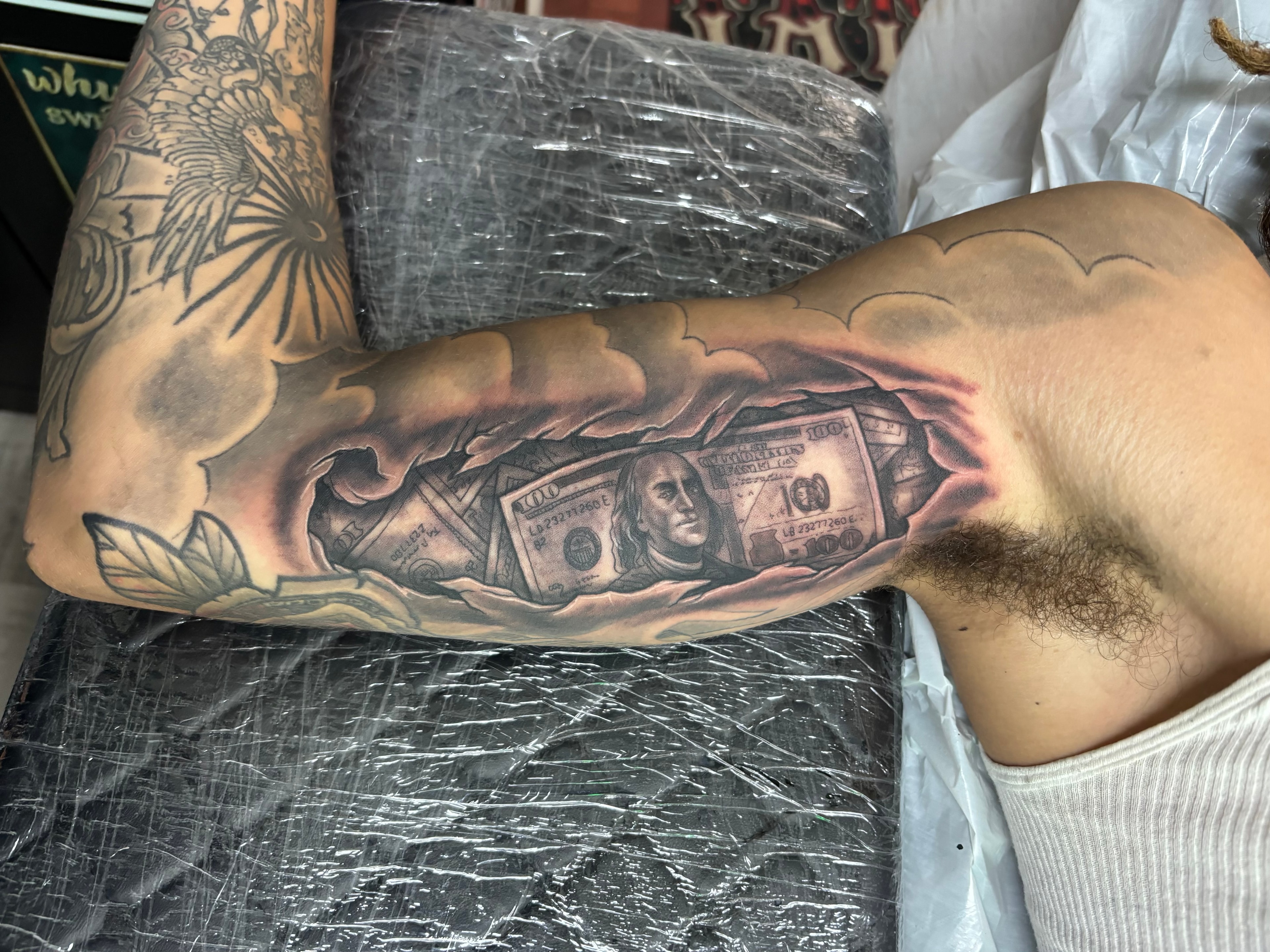 Randy DeShong money rip tattoo